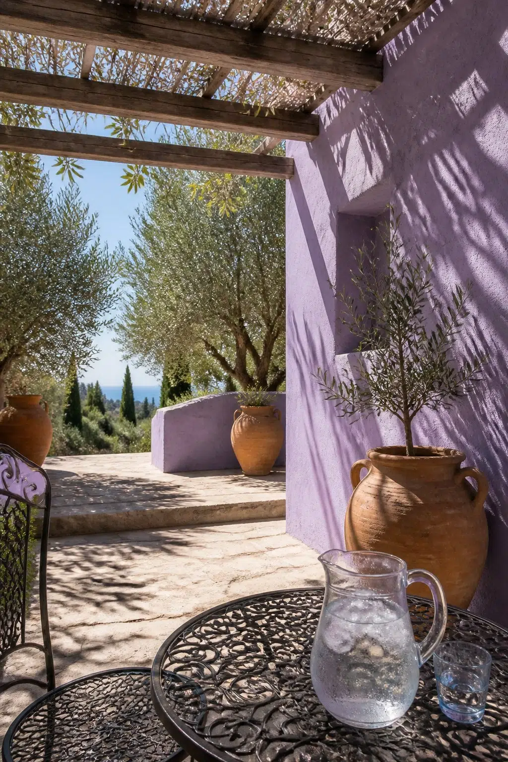 mediterranean patio featuring Berry Frappe by Sherwin-Williams