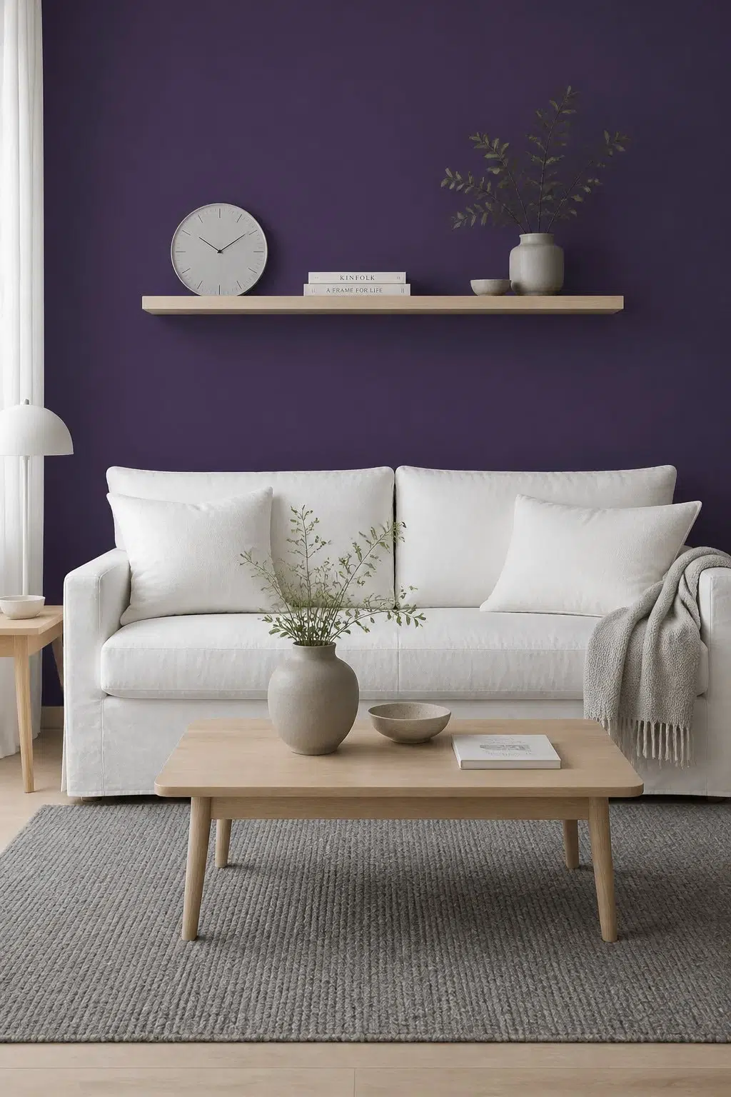 A scandinavian living room painted in Concord Grape